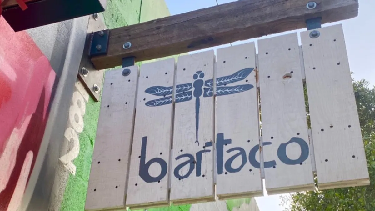 A photograph of a bartaco sign