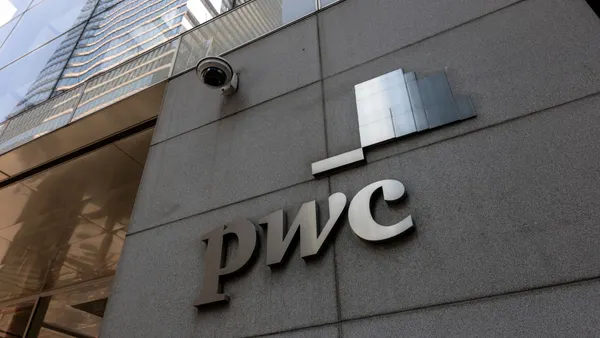 PwC logo at NYC headquarters.