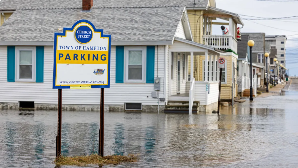 a flooded street remains deserted of people