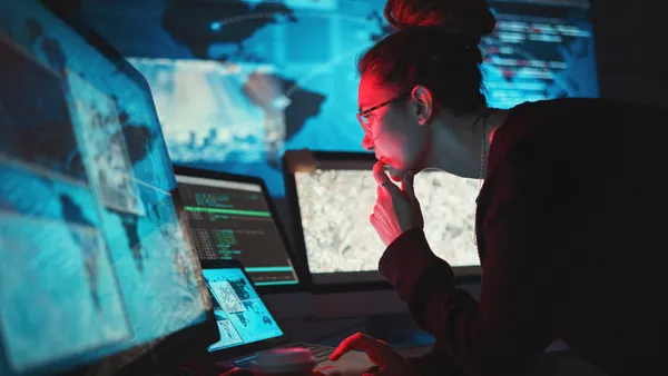 Cybersecurity, woman and computer with global network for phishing, ransomware and cyber search.