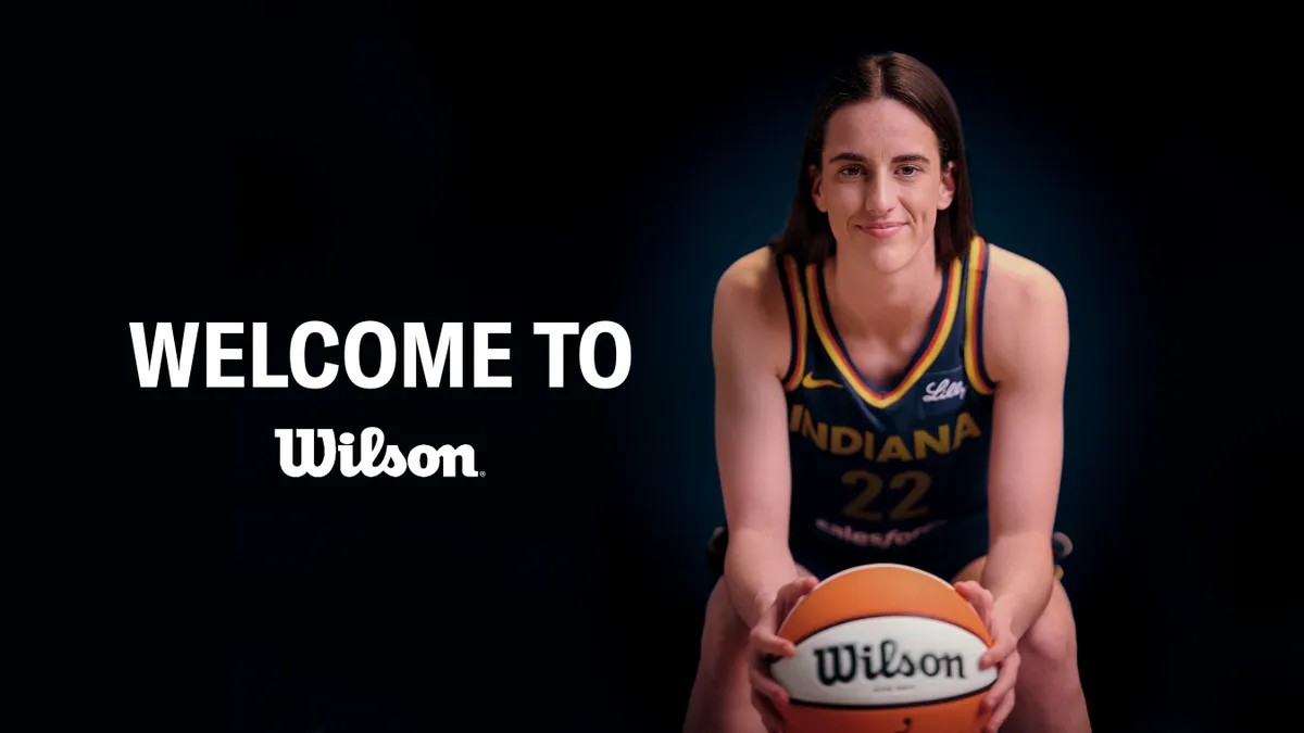 WNBA player Caitlin Clark holding a Wilson basketball on a black background, with the words "Welcome to Wilson."