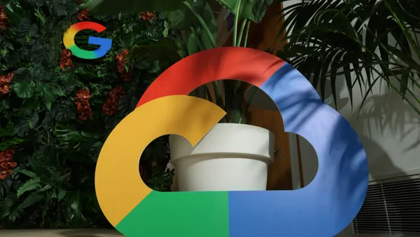 Google Cloud's multicolored cloud logo is pictured in the hallway of a conference center.