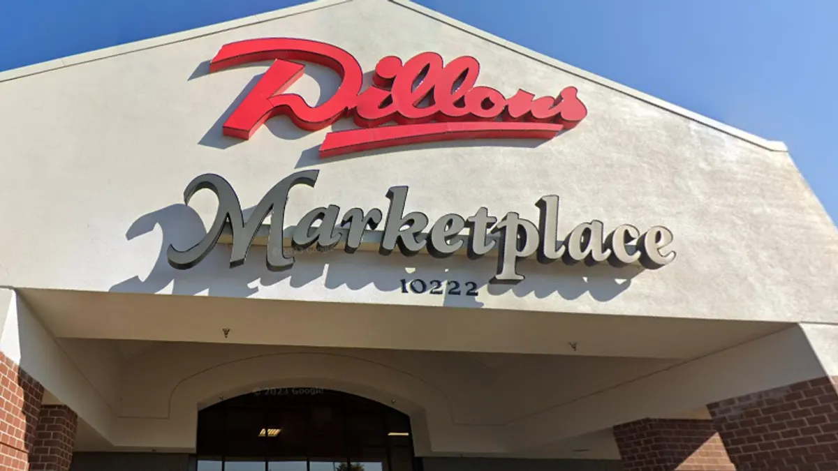 Exterior of a supermarket with the words "Dillons Marketplace" above the entrance.