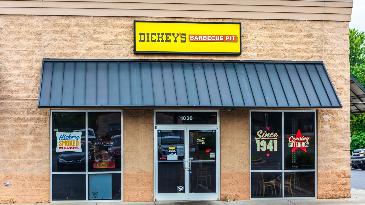 An image of a beige building with signage that says Dickey's Barbecue Pit.