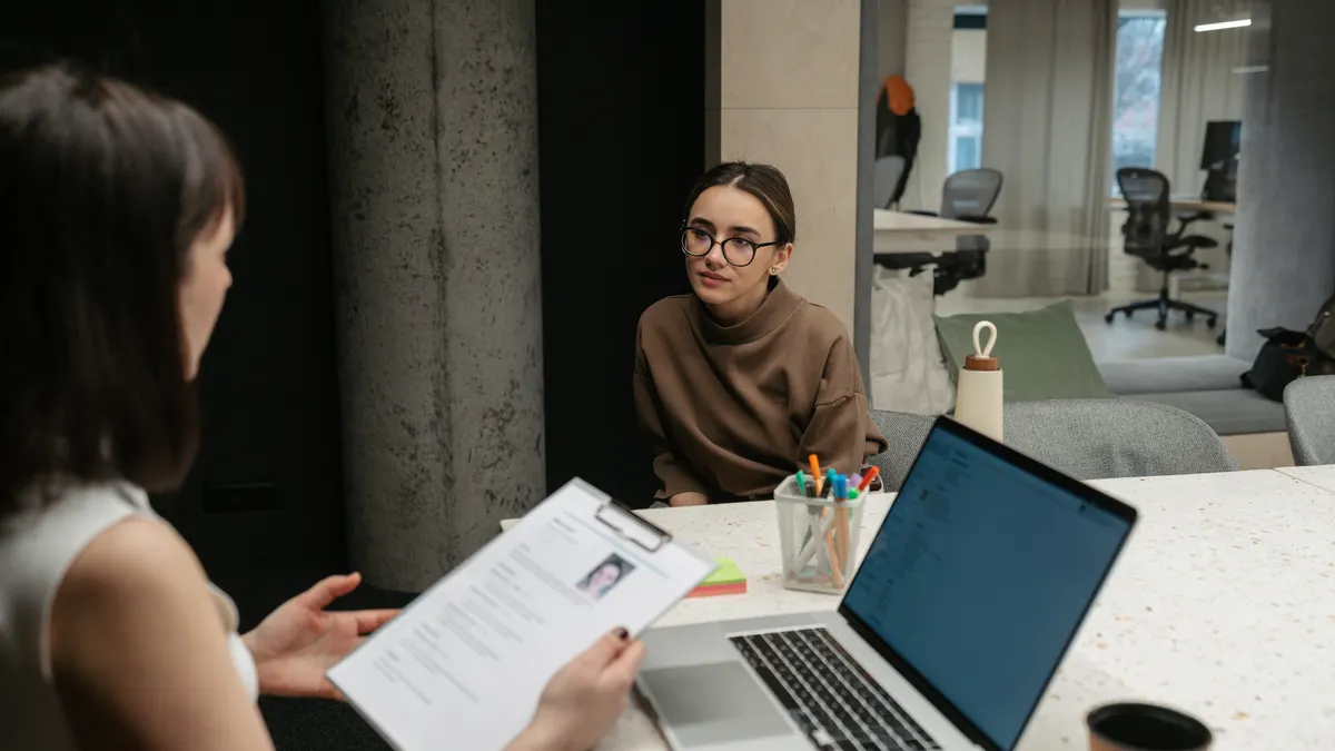 Photo of a young woman having a job interview.