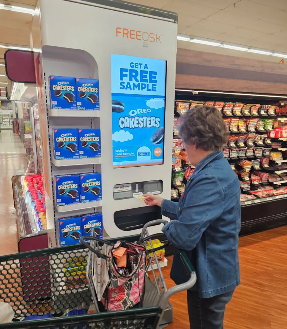 A Wakefern shopper uses a Freeosk terminal