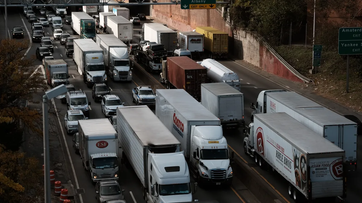 Cars and trucks move along the Cross Bronx Expressway in New York City on Nov. 16, 2021.