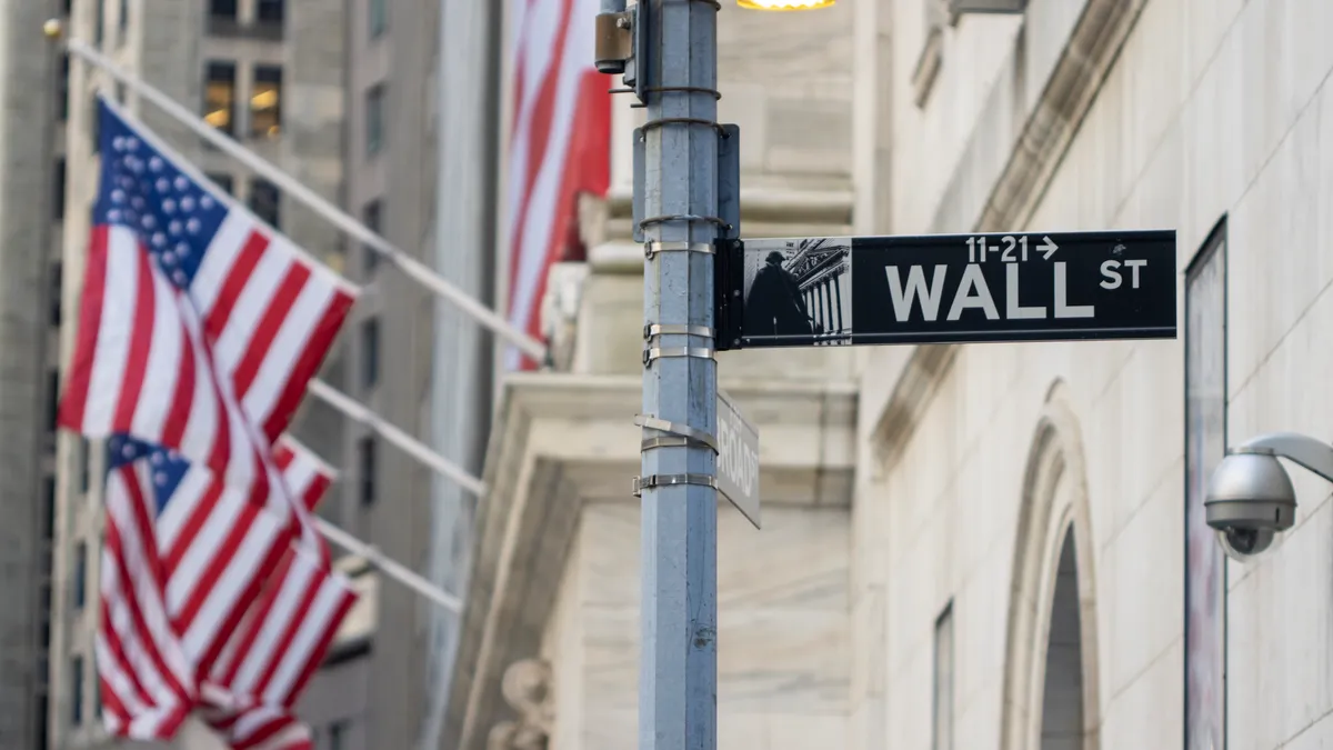 The Wall Street sign in the Financial District of Lower Manhattan in New York City.