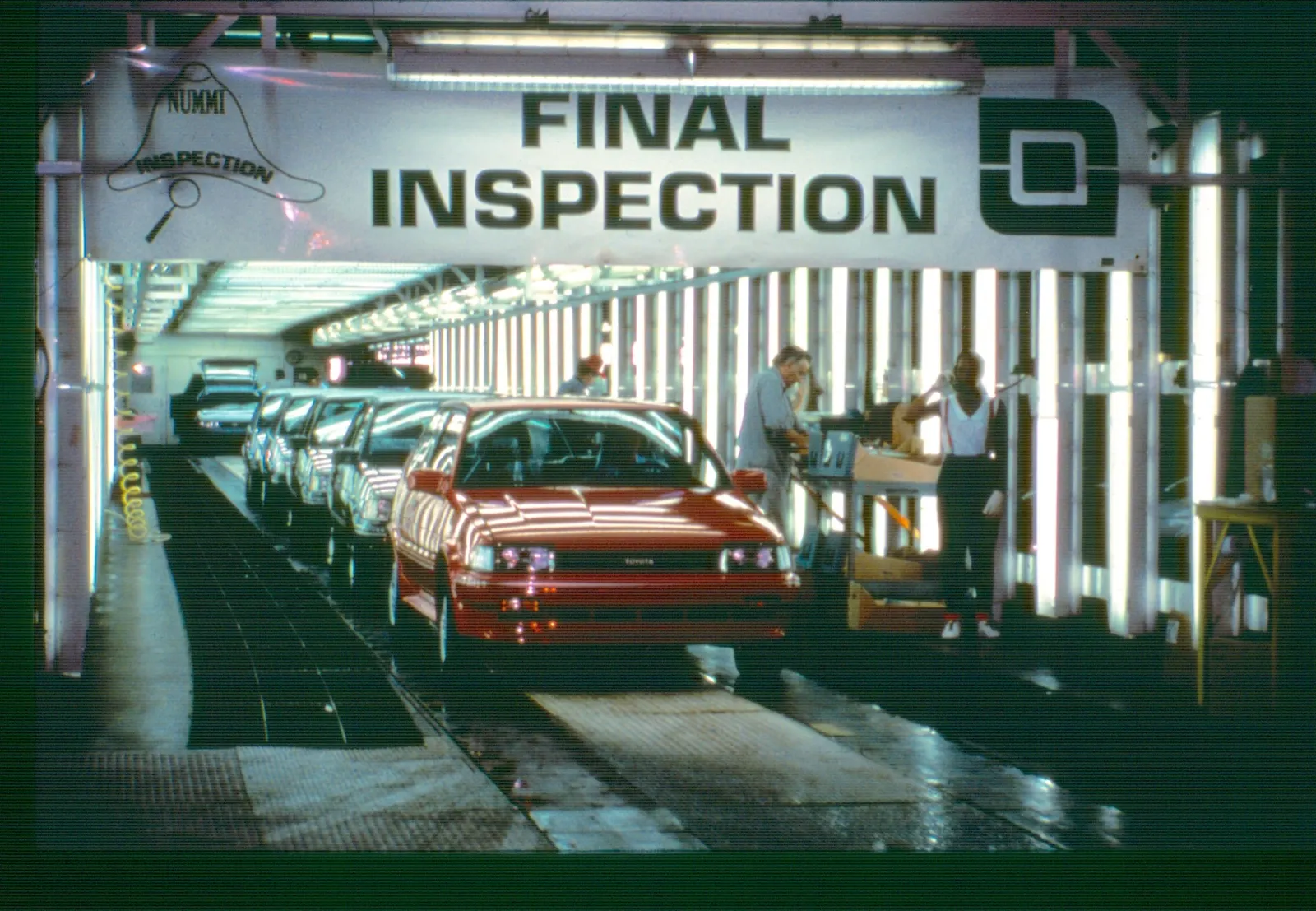 A Toyota Corolla going through final inspection in Fremont, California, at NUMMI in California, circa 1990.