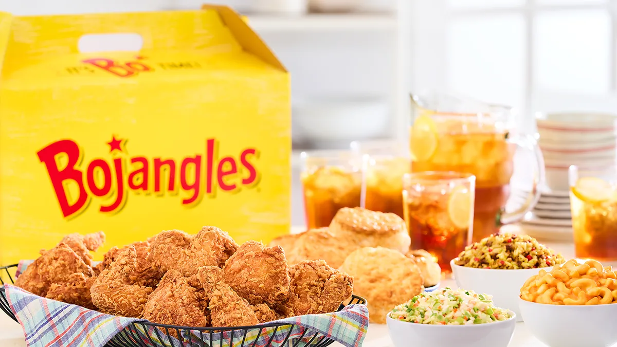 Bojangles family pack with a yellow and red box, biscuits, chicken and sides