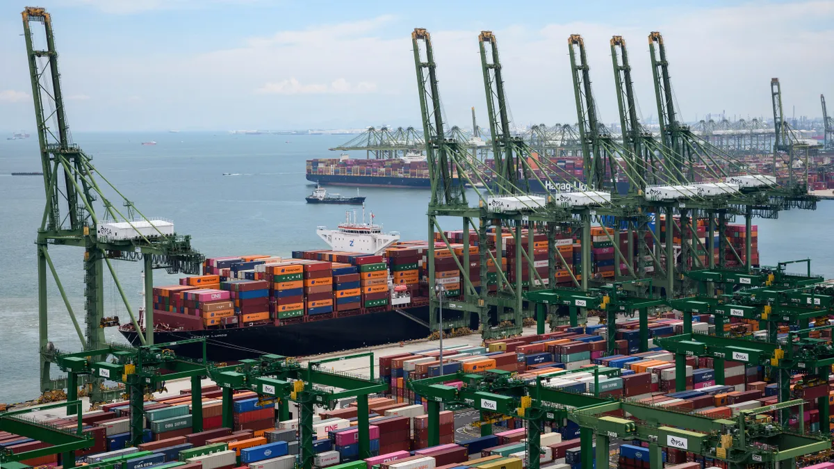 Containers are loaded on the premises of the the Port of Singapore Authority on June 14, 2022.