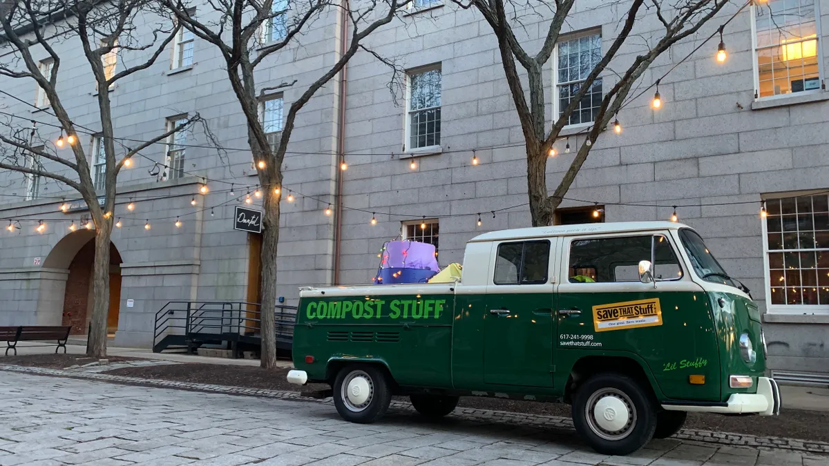 A VW Double Cab with the words "Compost Stuff" and the "Save That Stuff" logo