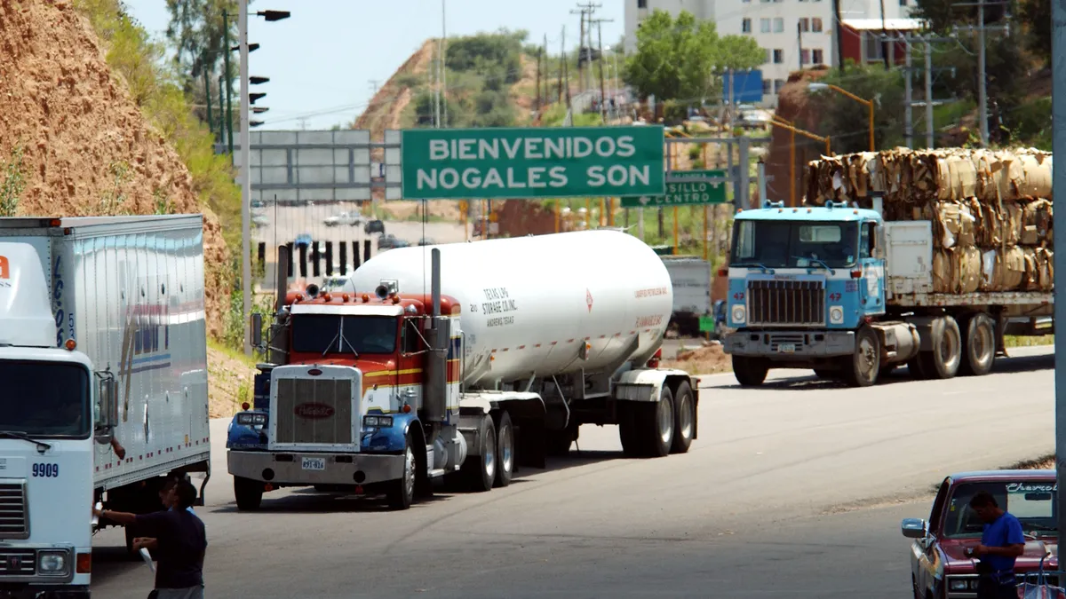 Northbound trucks cross the border to enter the United States from Nogales, Sonora, Mexico.