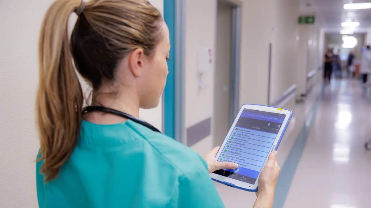 person on tablet