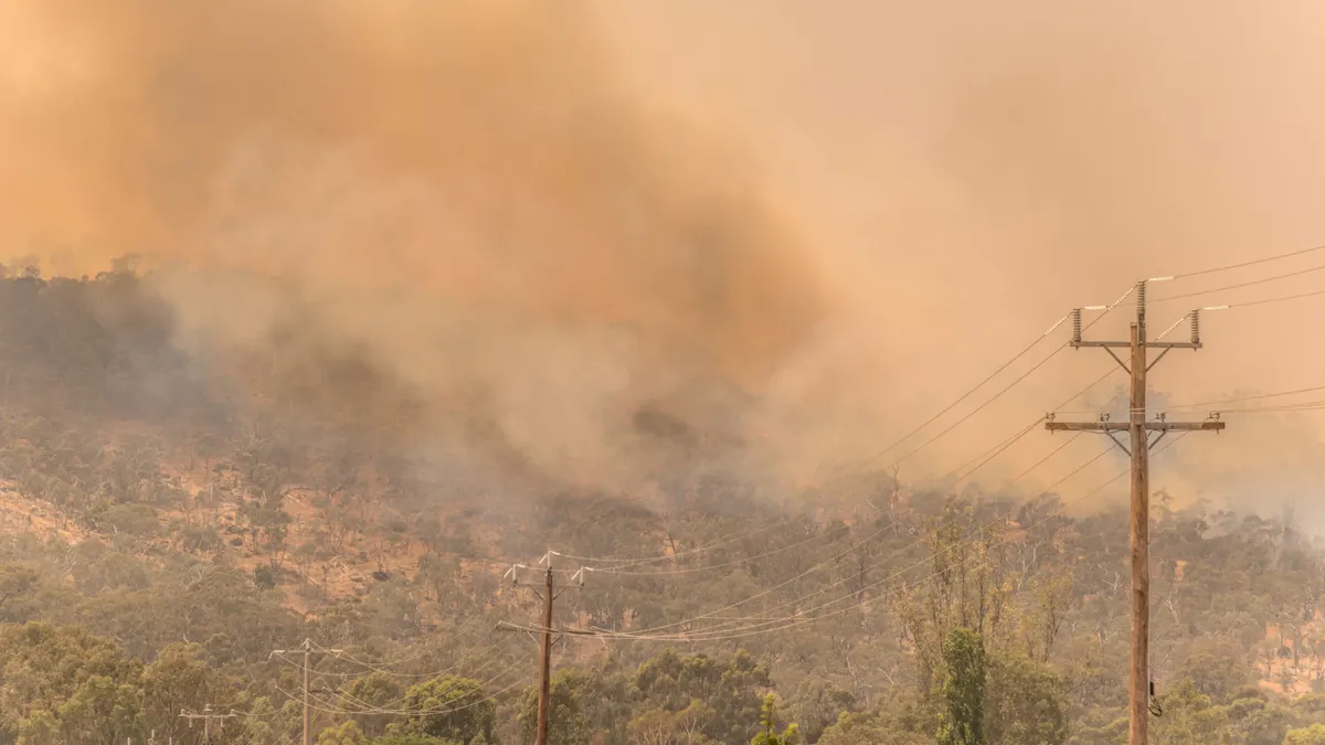 Brushfire with powerlines in the foreground