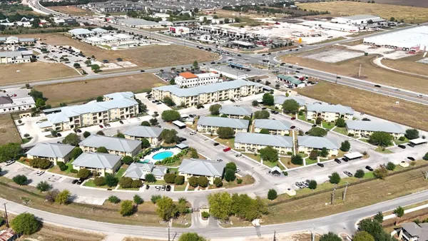 Aerial view of garden-style apartment comunity.