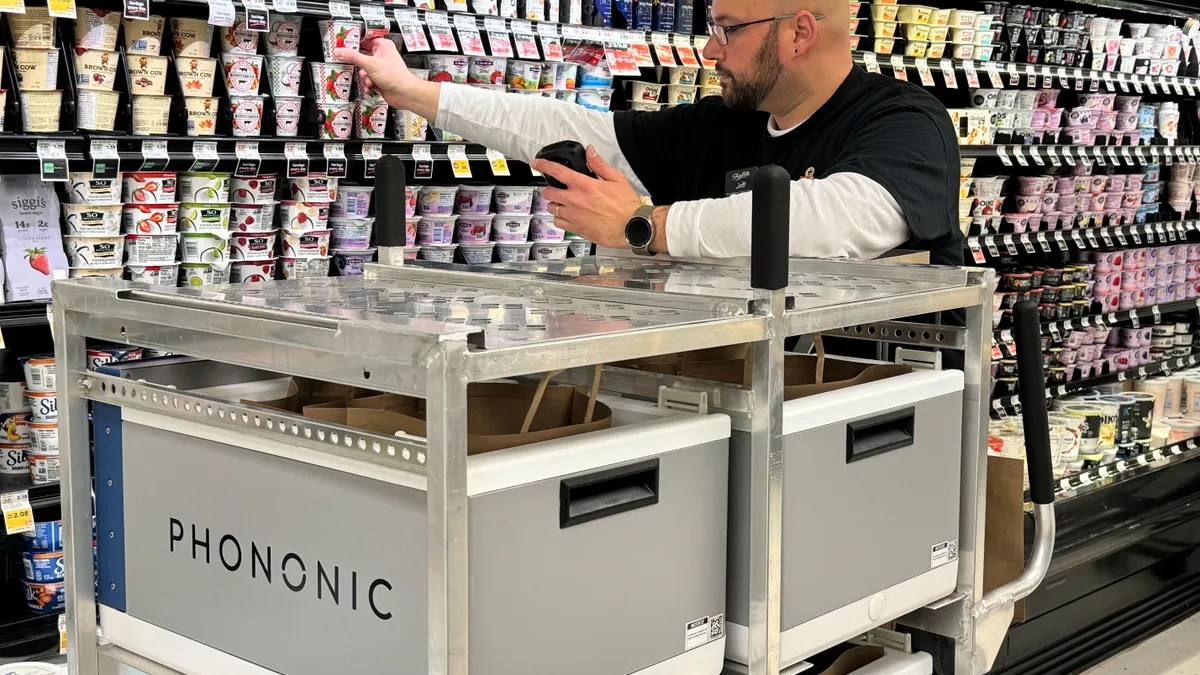 A worker at a grocery store.