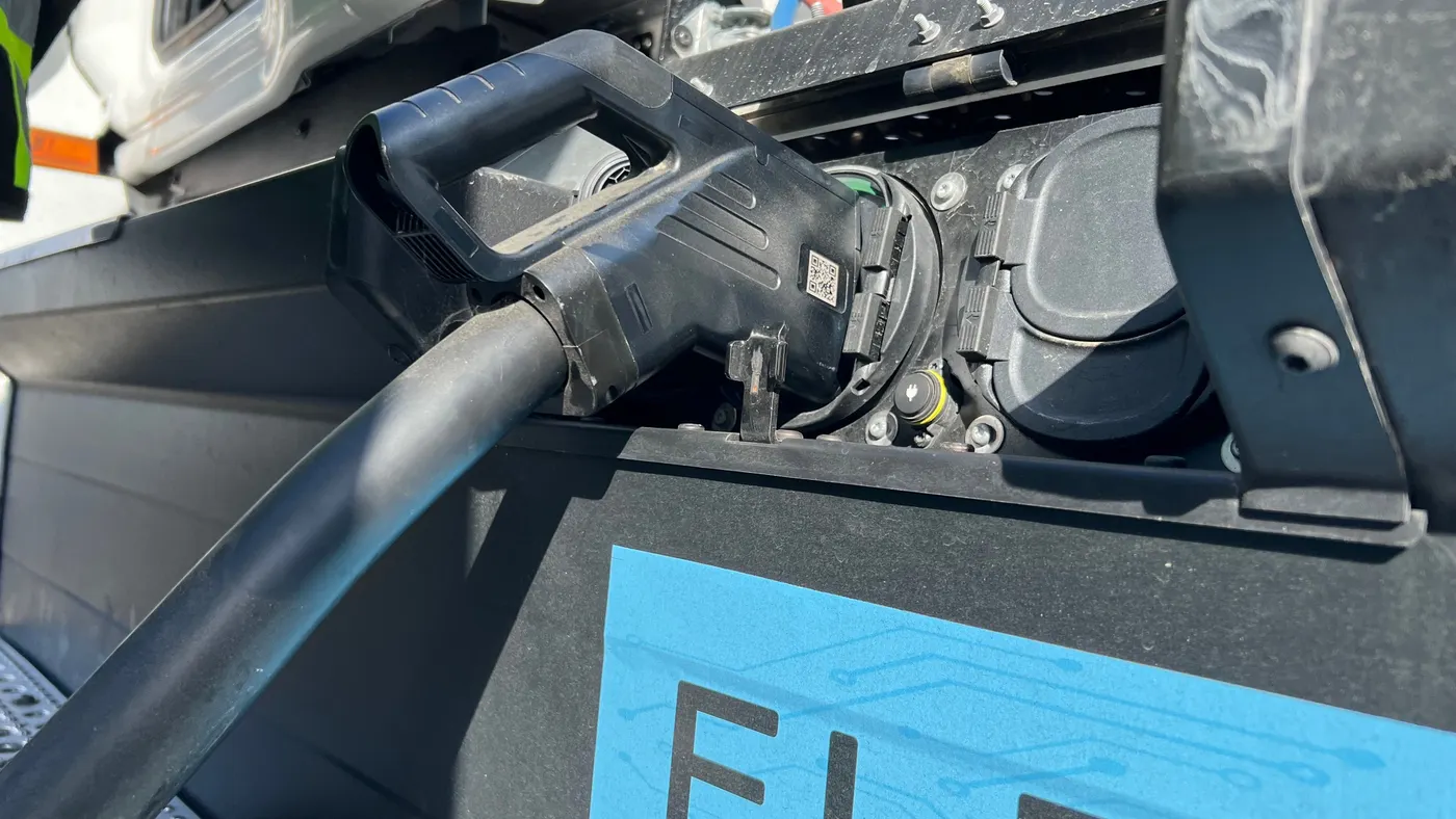 A Freightliner eCascadia is plugged into a fast-charging dispenser at Forum Mobility's FM Harbor site in Long Beach.