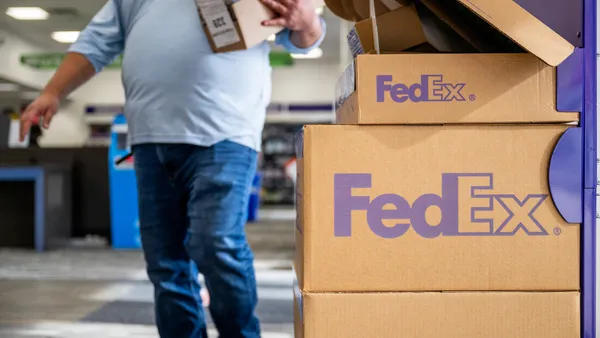 A customer walks into a FedEx store on December 21, 2022 in Houston, Texas.