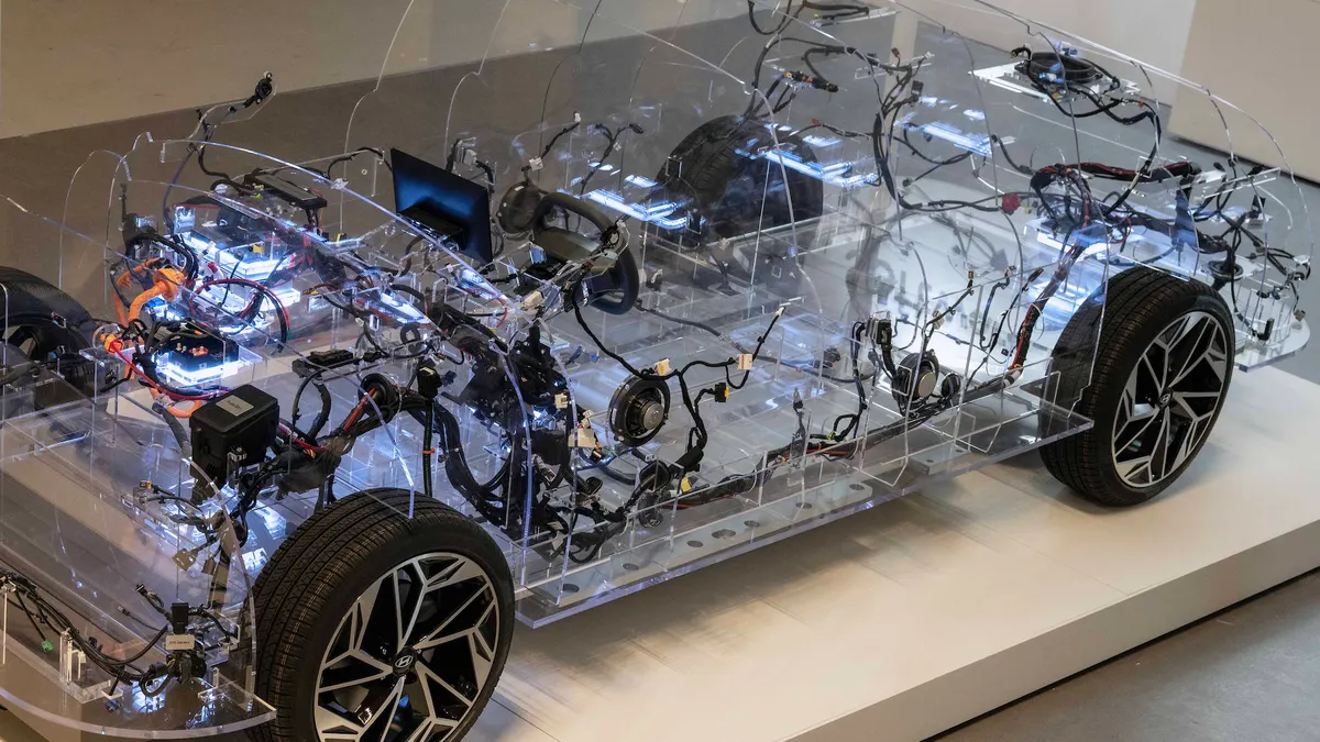 A view of wiring and various hardware components in a software-based Hyundai vehicle platform.