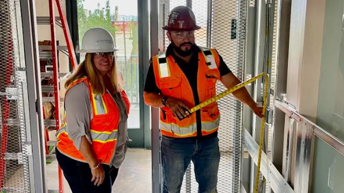 Two people at a construction jobsite