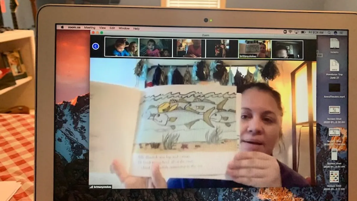 An Alabama pre-K teacher reads to students over Zoom.