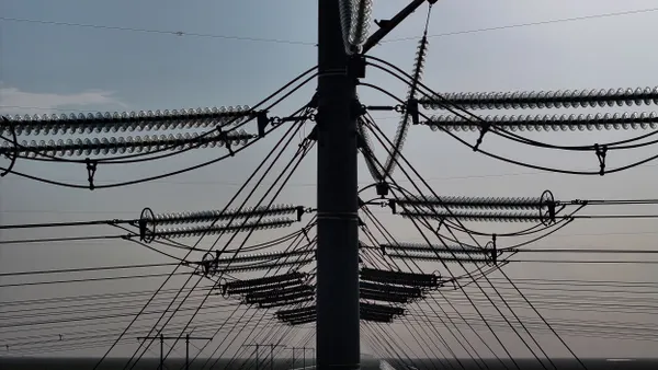An aerial view of high voltage power lines.