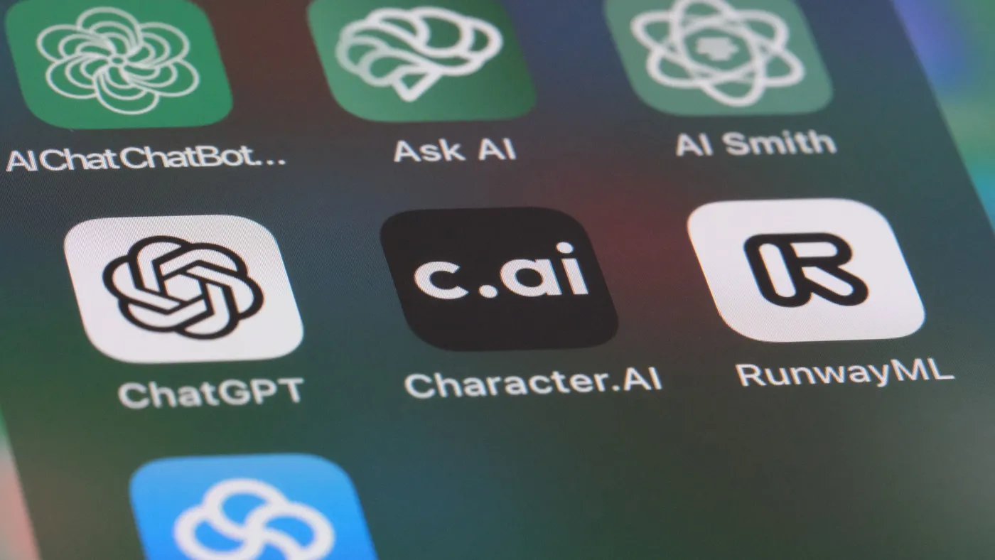 Seven different icons for different artificial intelligence apps display side by side on a phone screen.
