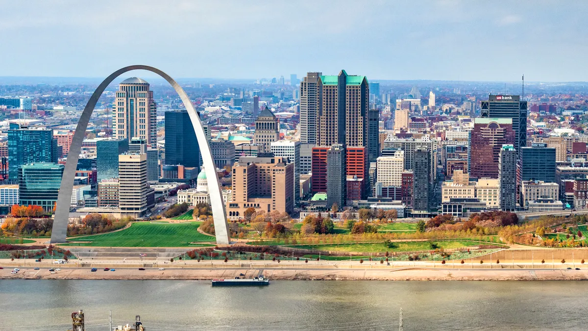 The skyline of the city of St. Louis, Missouri on the banks of the Mississippi River.