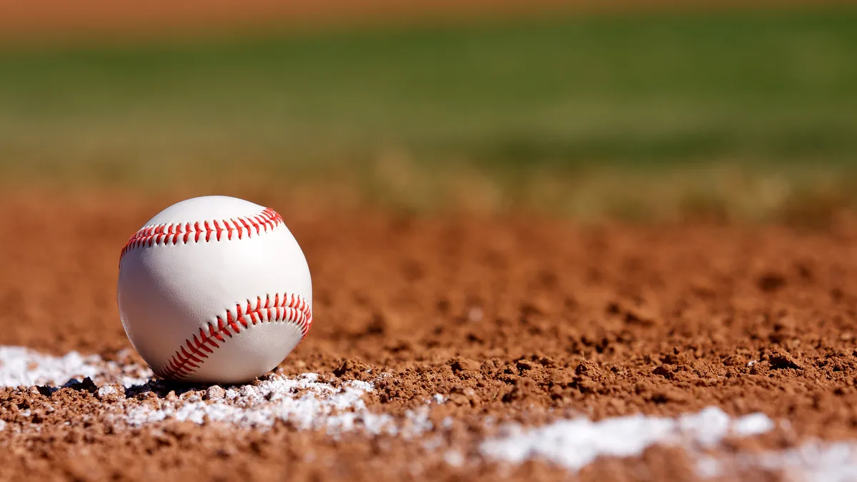 Baseball on the Chalk Line of the Infield