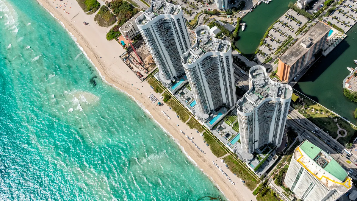 An aerial view of a South Florida beach resort shot from directly overhead at about 1000 feet in altitude.