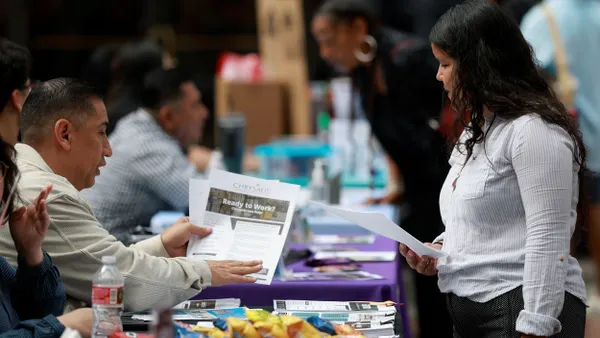 One person shares a flyer that says "Ready to Work?" with another person.