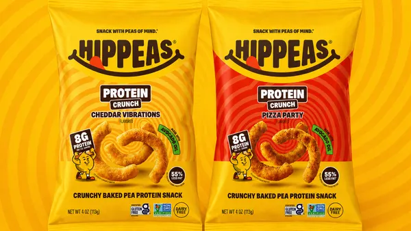 A photo of two yellow bags of snacks against a yellow and orange swirled background. The bags say Hippeas protein crunch, 8 grams protein, crunchy baked pea protein snack. One says Cheddar Vibrations and the other says Pizza Party.