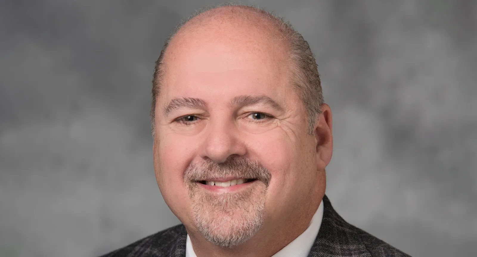 A headshot of robert riney