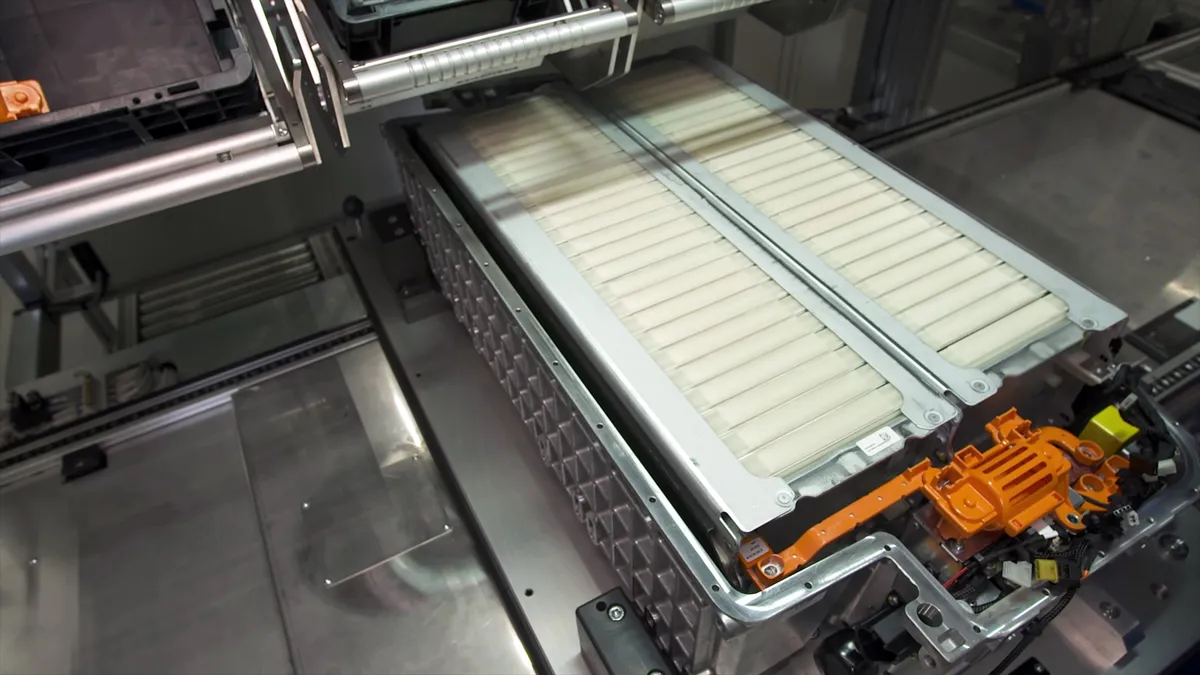 Close-up of an electric car battery in a factory on the assembly line.