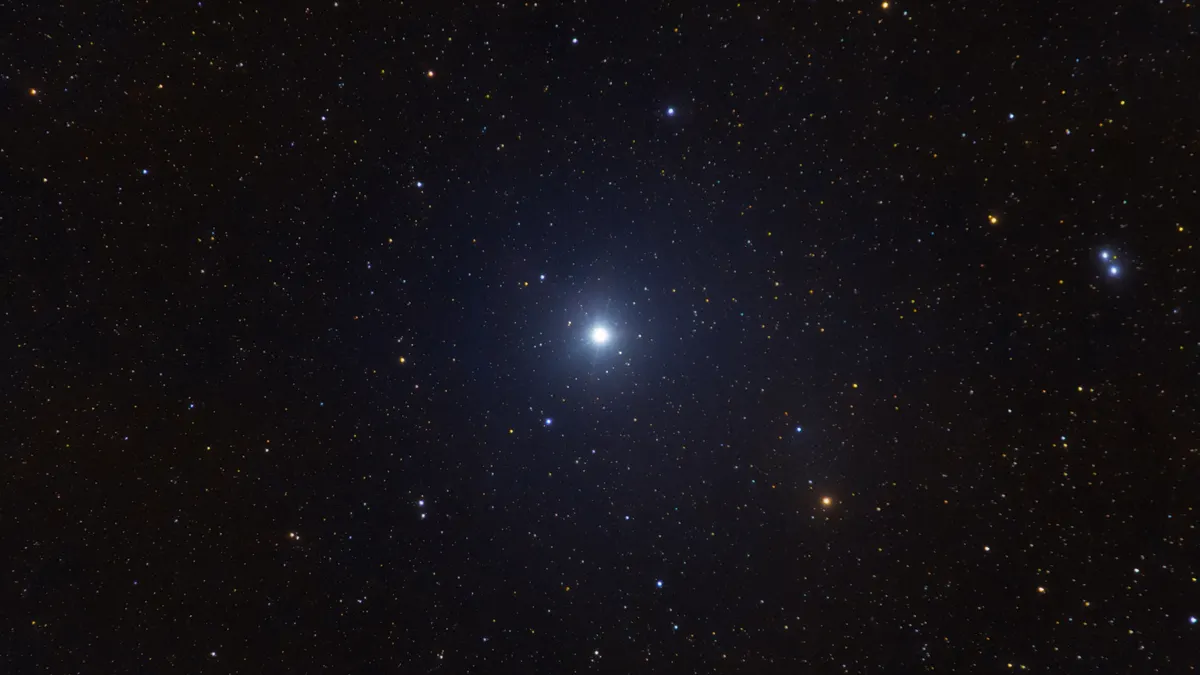 A low angle shot of the shining star Vega in the constellation Lyra.