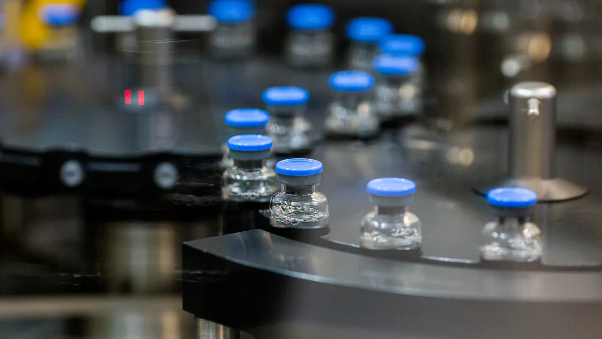Capping of investigational remdesivir vials, photo by Gilead Sciences