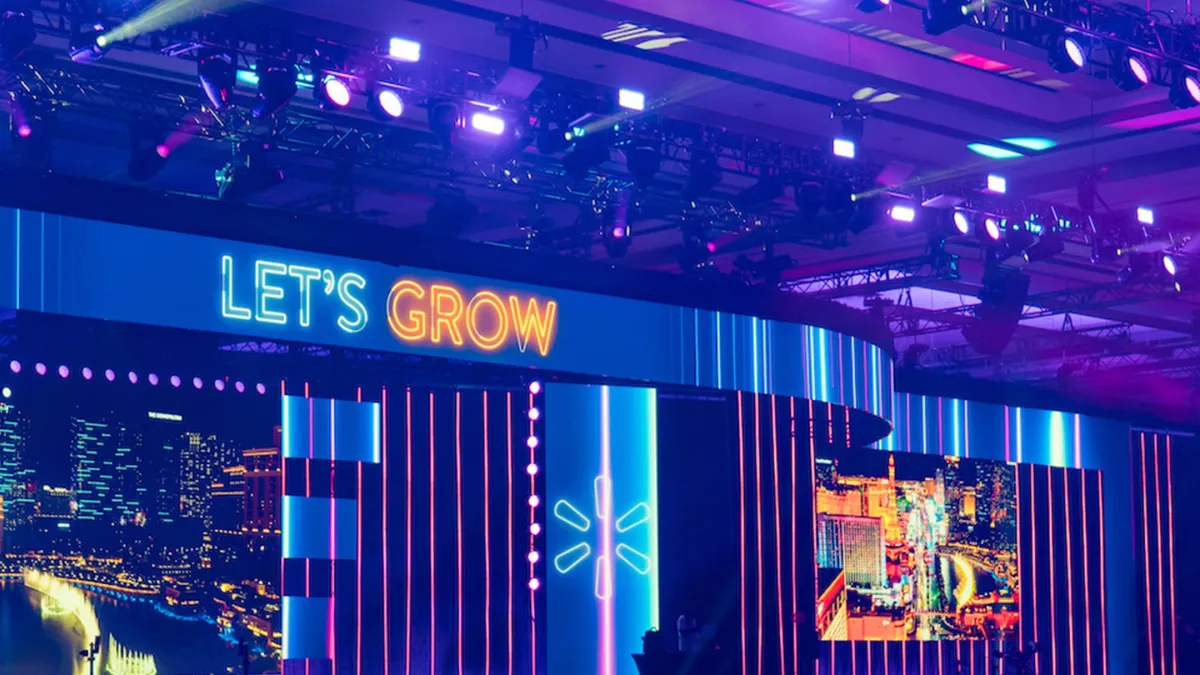 Walmart Marketplace conference featuring a "Let's Grow" neon sign.