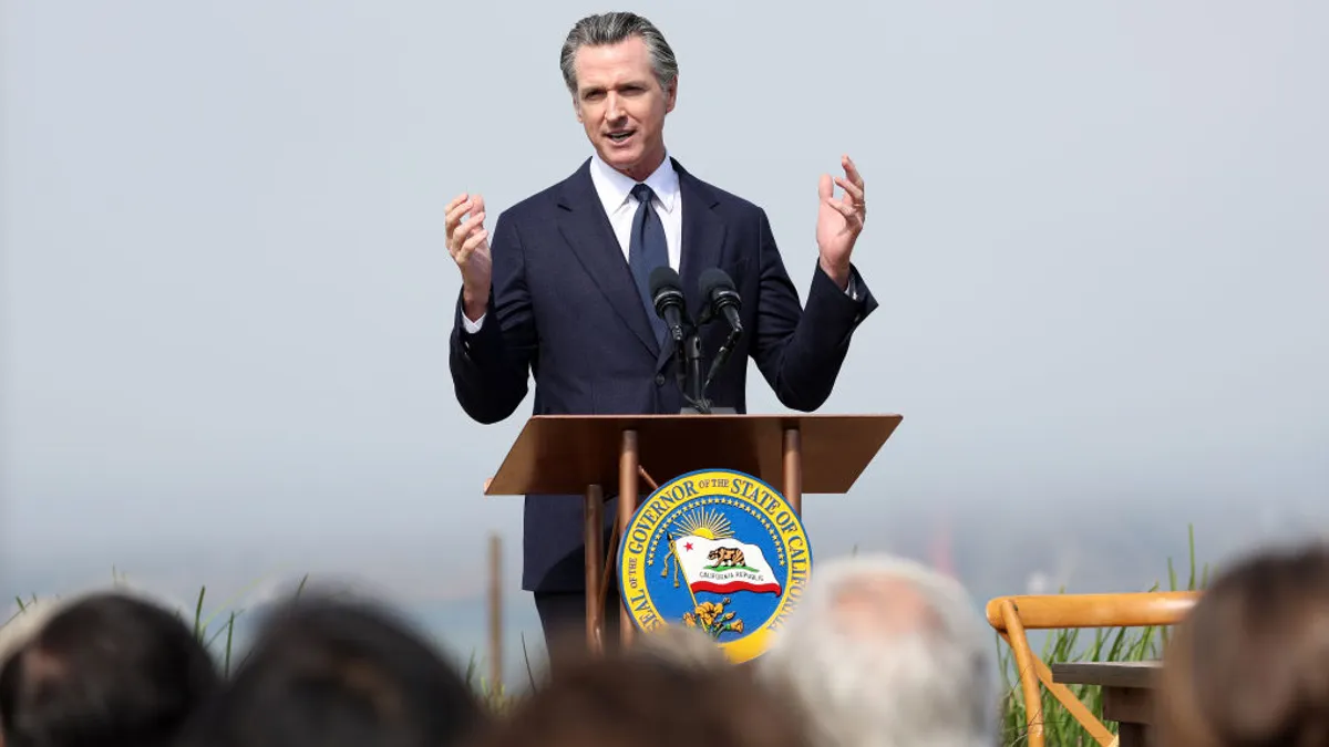 California Gov. Gavin Newsom talks during a news conference in October 2022.