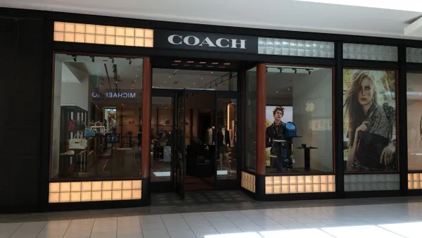 A Coach storefront in a mall.