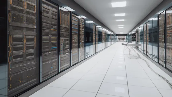 Cloud computer hardware room lined with cloud servers.