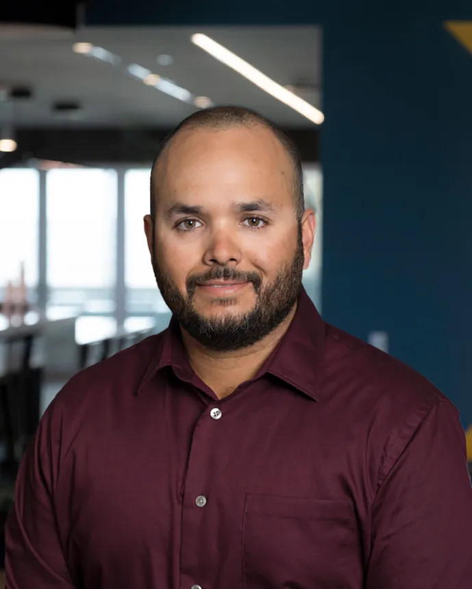 Headshot of Eric Hernandez.