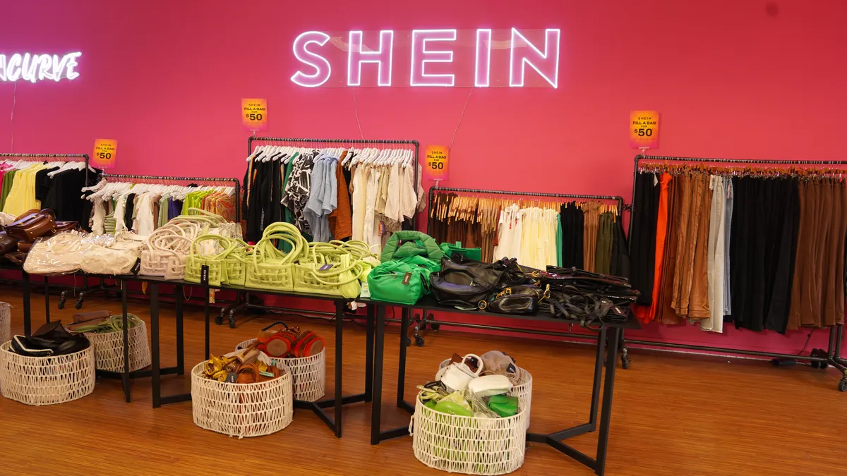 Rows of clothes are seen in a Shein store.