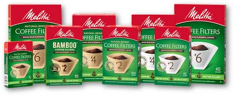 A variety of green and red boxes of Melitta coffee filters.