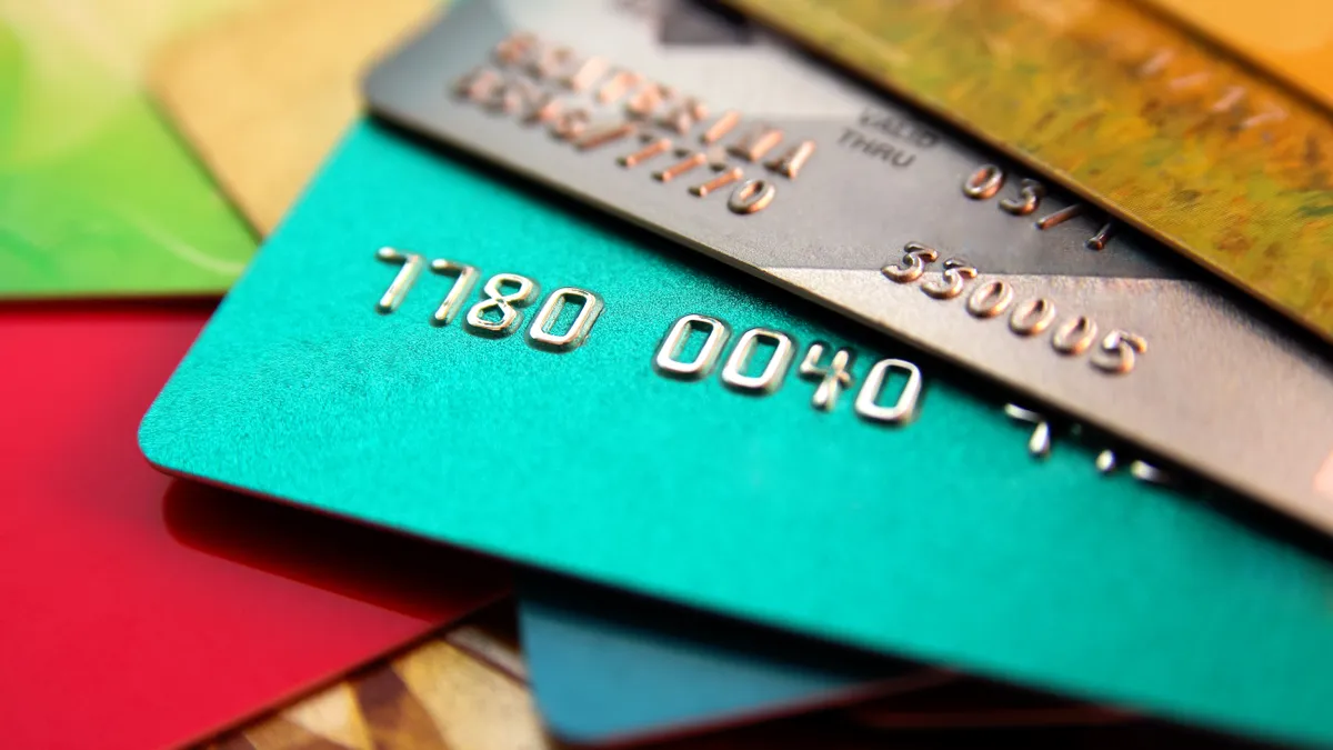 Stack of credit cards spread out