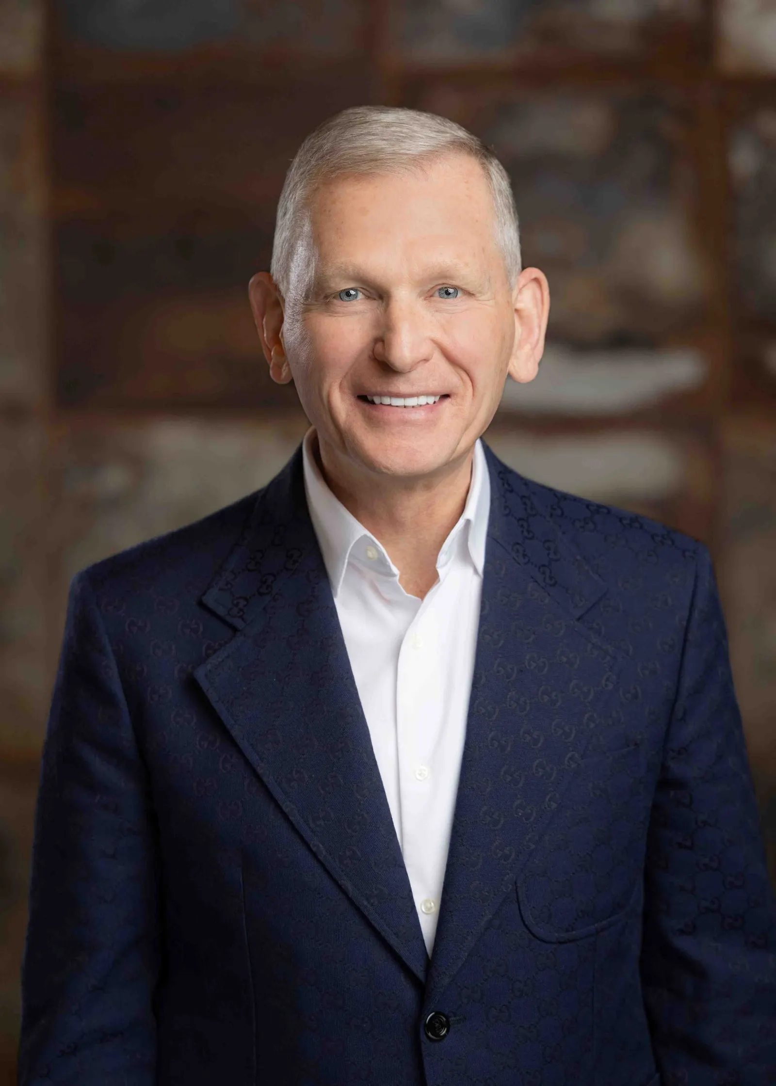 Headshot of a man in a suit