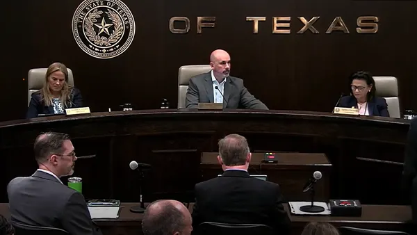 Public Utility Commission of Texas Chairman Thomas Gleeson leads a discussion of the state's pause of new data center interconnections with officials from the Electric Reliability Council of Texas at an Aug. 20, 2026, open meeting.