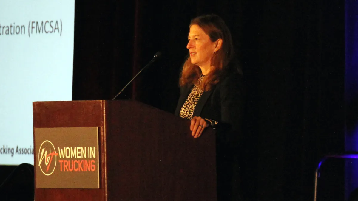 FMCSA head Robin Hutcheson talks on stage at the Hilton Anatole in Dallas.