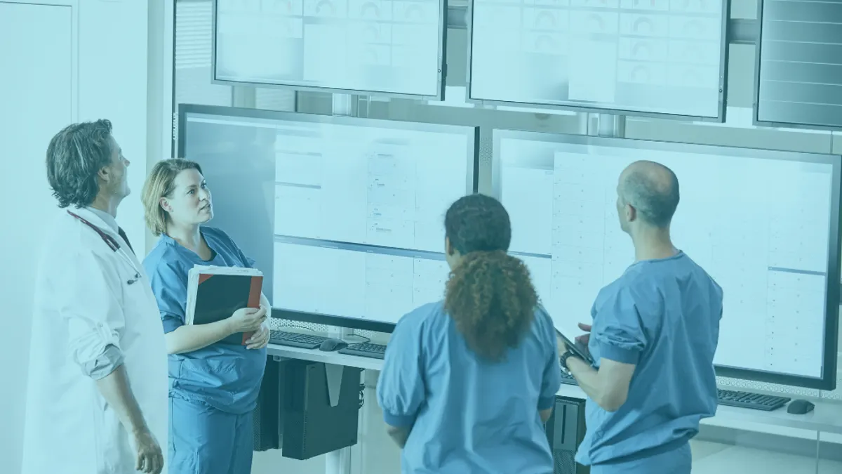 Doctors and Nurses with white boards in the background