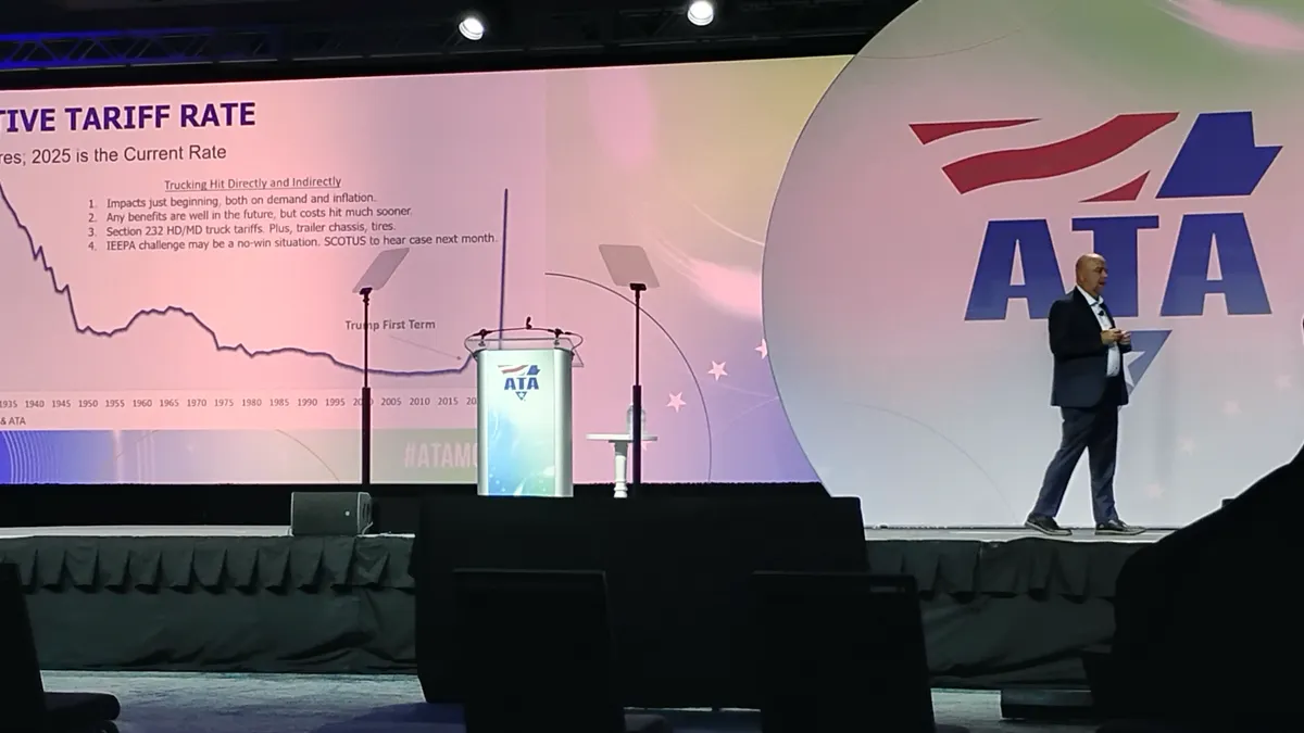 American Trucking Associations Chief Economist Bob Costello addresses MCE 2025 attendees during an annual address.